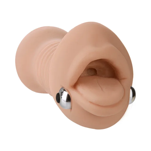 Close view of molded mouth opening and two silver massage beads