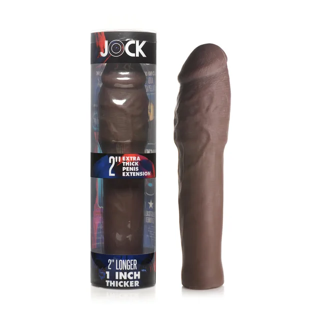dark brown Jock Extra-Thick textured TPE sleeve beside retail box