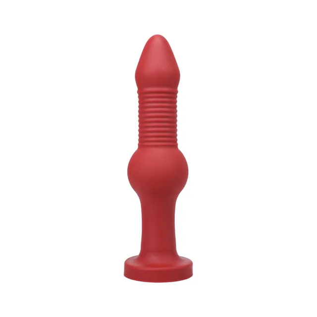 Front view of Ruby Tantus Fido with ribbed shaft center bulb and round base