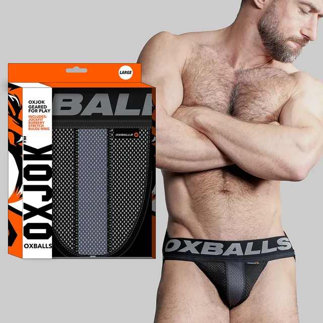 Oxballs Oxjok black and gray mesh jockstrap on model beside box