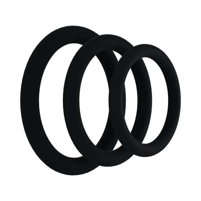 Rock Solid Black Silicone Gasket Ring Set three ring sizes arranged on white background