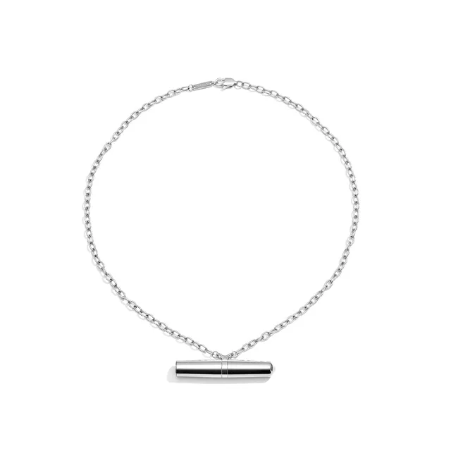 Crave Tease silver cylindrical pendant necklace vibrator full necklace with horizontal pendant centered below the chain