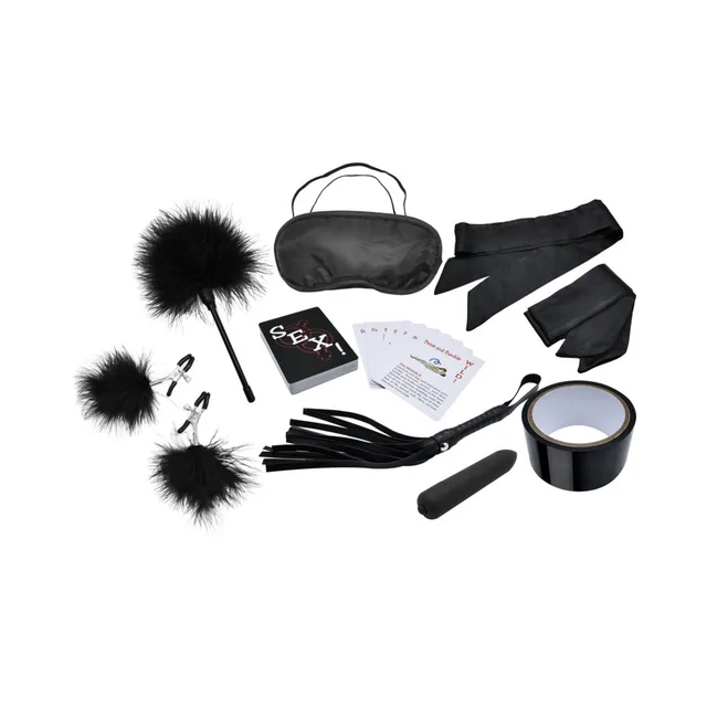 Black Midnight Moods kit spread out with ties, blindfold, ticklers and tape