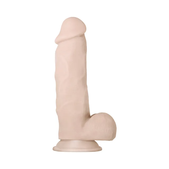 Side view of upright beige poseable dildo and suction base