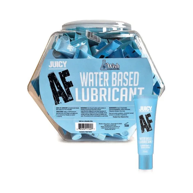 clear Juicy AF fishbowl filled with blue 10 ml lubricant tubes beside one upright tube