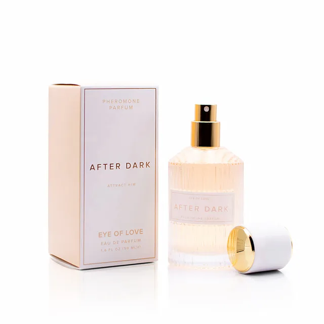 large pale-gold After Dark spray bottle with cap removed beside matching box