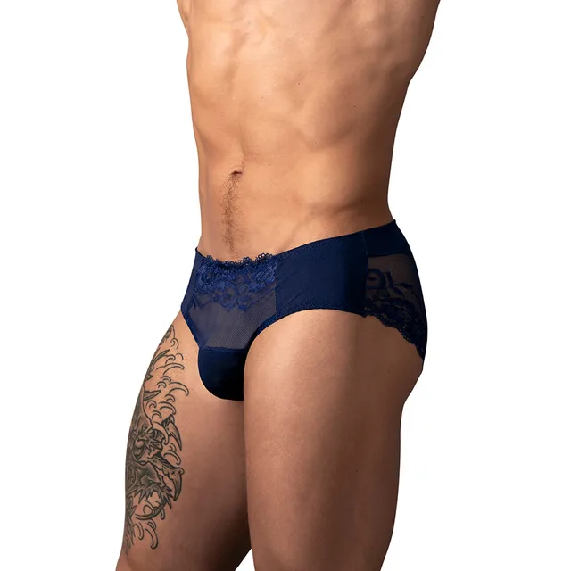 Male Power Sassy Lace Bikini in navy size XL worn from the front to show the solid pouch and lace sides