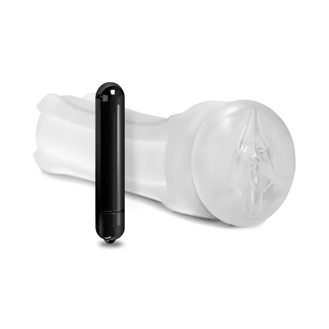 Clear pussy-opening sleeve beside black bullet vibrator
