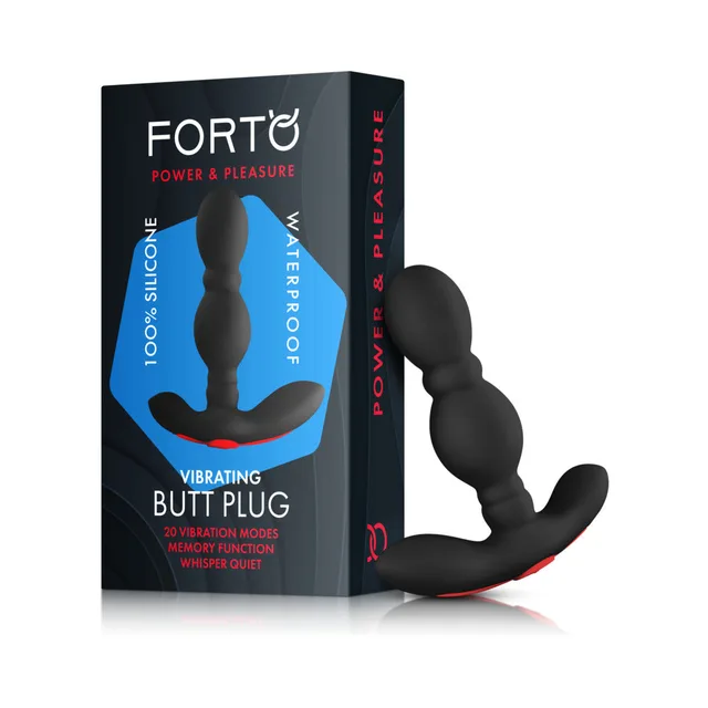 Forto black vibrating anal plug beside retail box