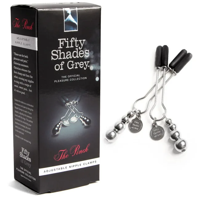 Fifty Shades The Pinch Clamps silver beaded clamps with black tips beside tall box
