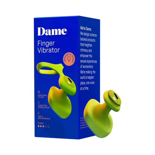 Citrus green Dame Fin 2.0 finger vibrator beside blue retail box
