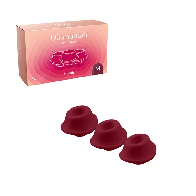 Three Bordeaux Womanizer Type A medium heads below retail box