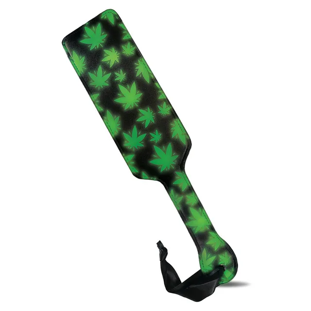 black faux leather paddle with green leaves and wrist loop