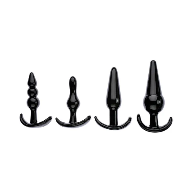 Adam & Eve black four-piece anal plug kit four plugs standing upright
