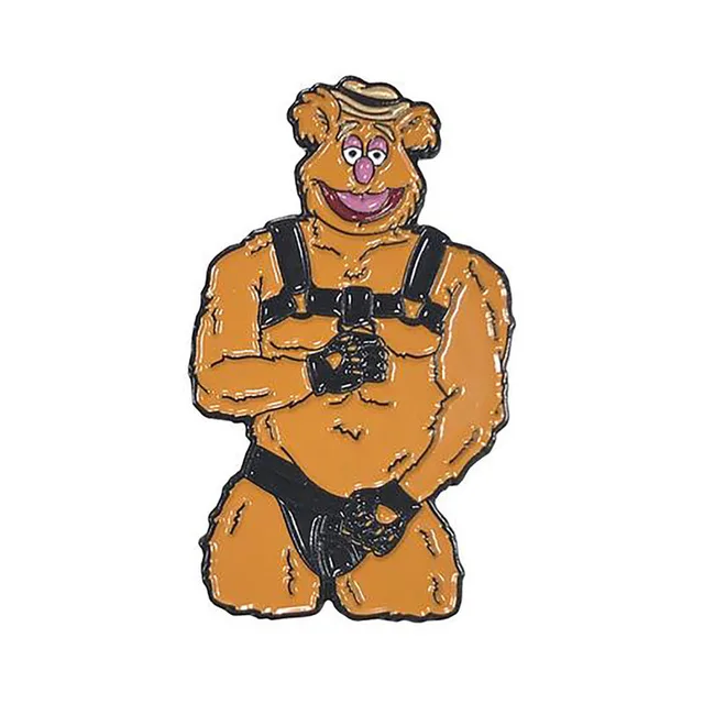 brown shaggy Bear character enamel pin with black harness details
