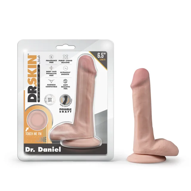 Dr. Daniel beige posable dildo beside clear retail package