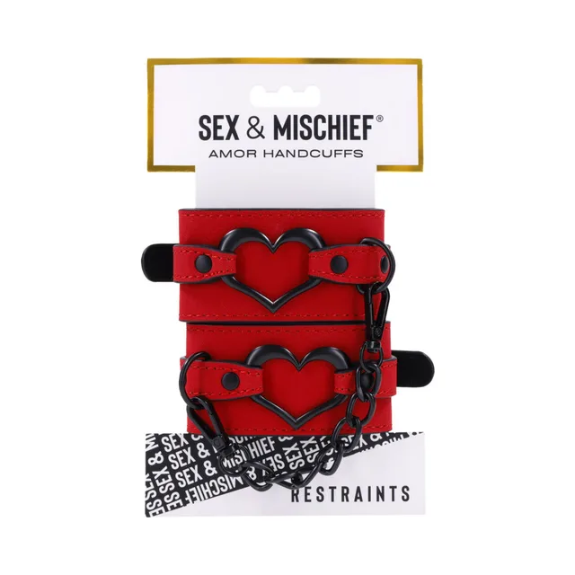 red Sportsheets Amor handcuffs with black heart frames and connecting chain on hang card