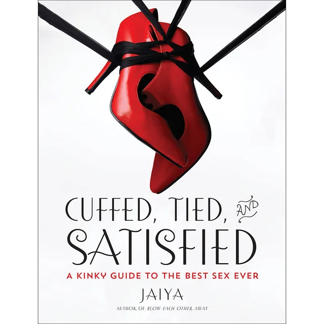 white Cuffed Tied and Satisfied cover with red blindfold and black ribbon ties