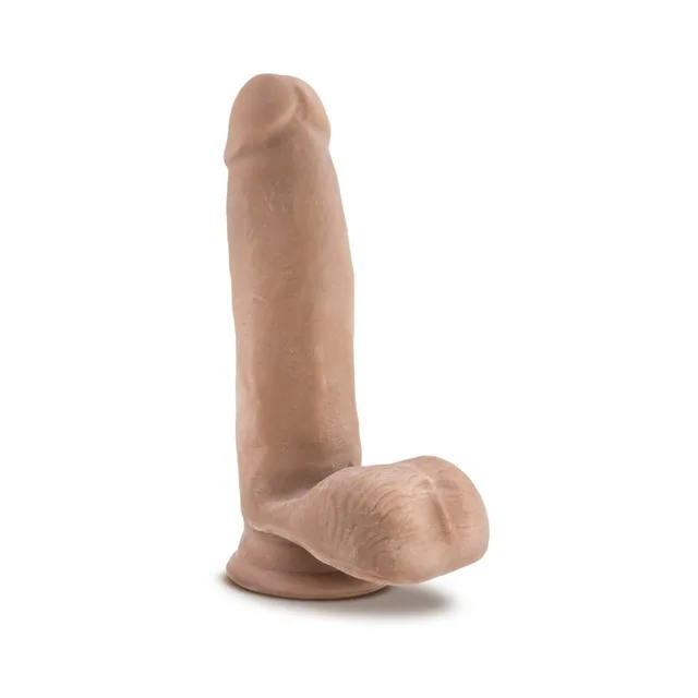 Au Naturel Tan 7 Inch Dildo upright front angle on round base