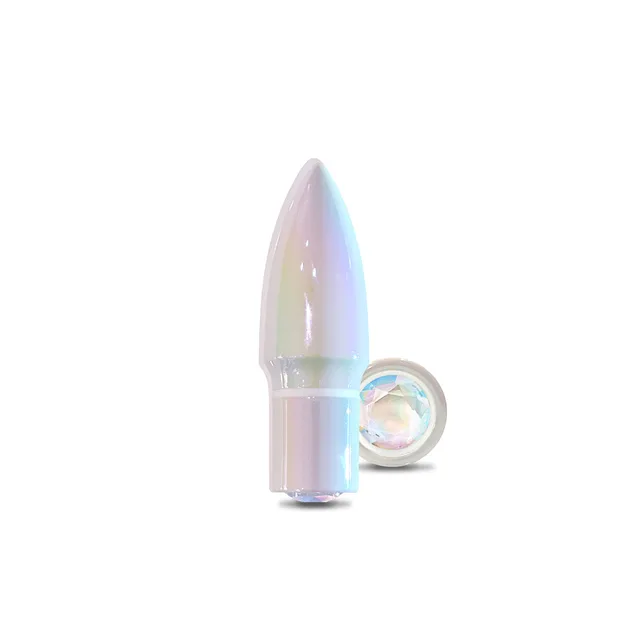 WINX Star Tickles pointed rocket vibrator standing beside round jewel base