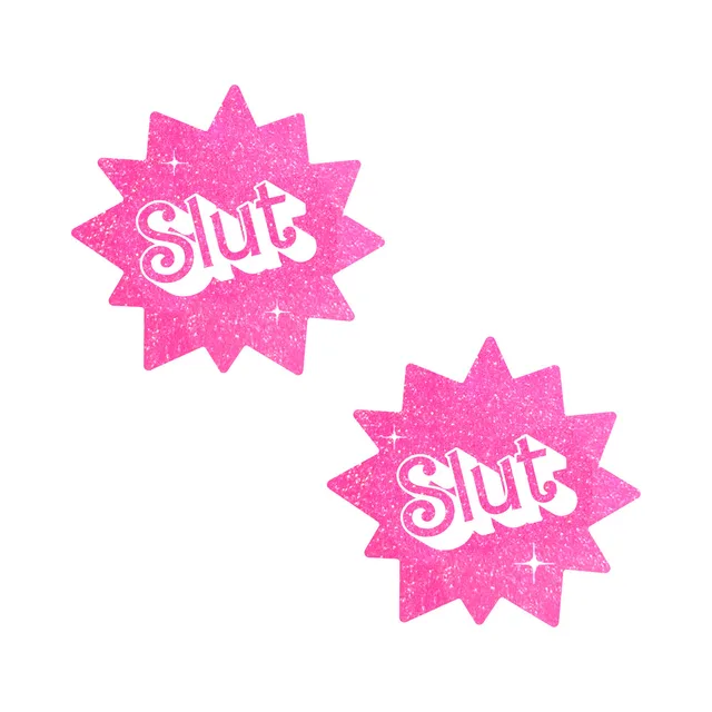 pair of hot pink glitter starburst nipple pasties with large white Slut lettering