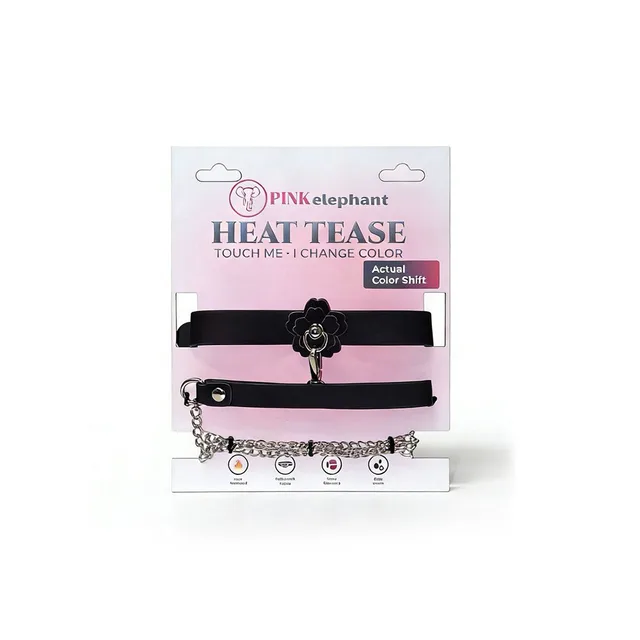 Pink Elephant Heat Tease flower collar retail card with black collar, flower center and silver-tone chain