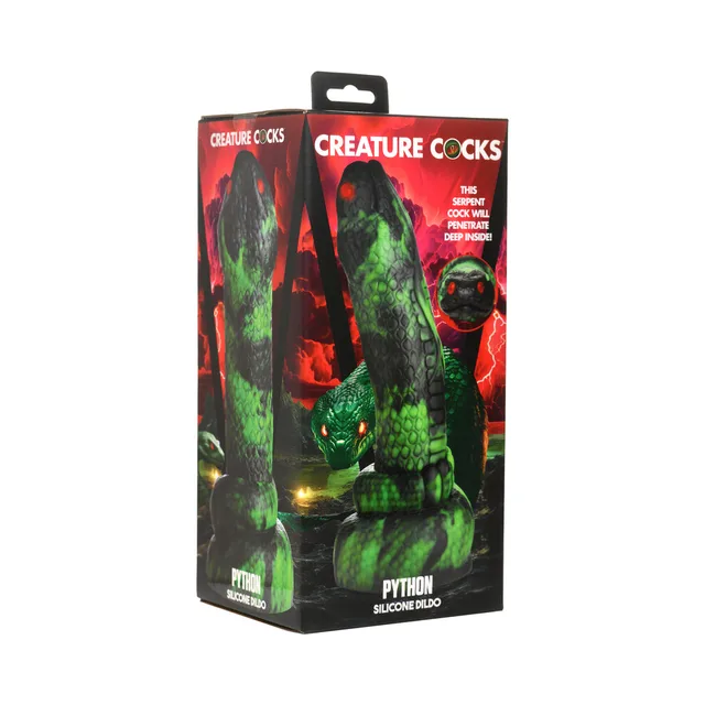 Creature Cocks Python green scaled dildo with red eye detail beside illustrated retail box