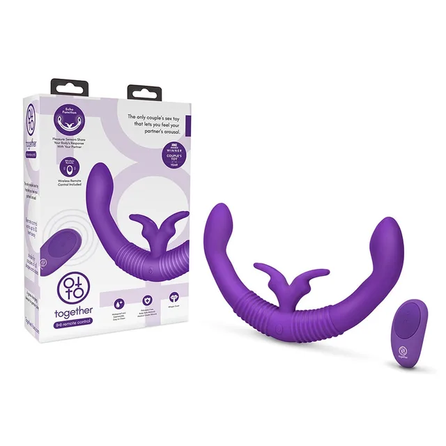 Purple Together Toy dual-ended rabbit beside box and remote