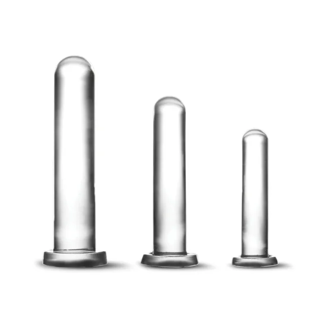 Three clear graduated dilators standing by size