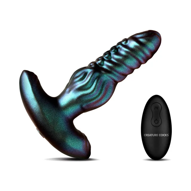 Creature Cocks Octo-Squirm teal vibrating plug beside its oval black remote