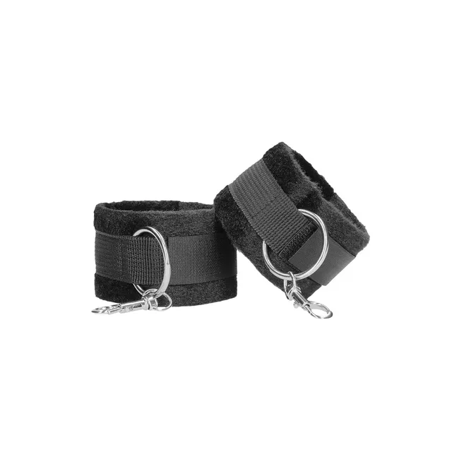 Pair of black hook-and-loop cuffs with D-rings and snap hooks
