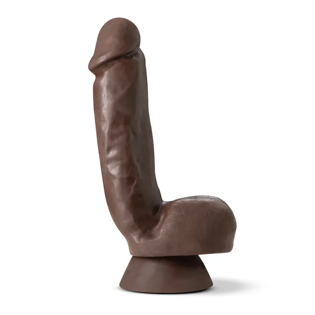 Upright view of thick brown shaft with molded balls