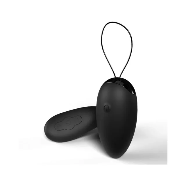 Black remote egg vibrator standing beside oval controller