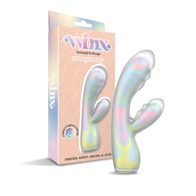 Pastel WINX Honey Bunny rabbit vibrator displayed beside peach retail box