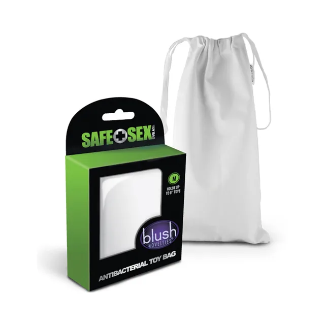 Blush Medium White Drawstring Toy Bag white storage bag beside green black retail carton