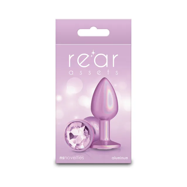Small iridescent-pink Rear Assets aluminum plug beside its gem base view