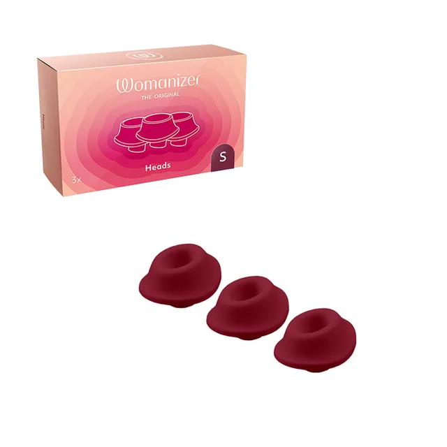 Three small Bordeaux Womanizer Type A heads below retail box