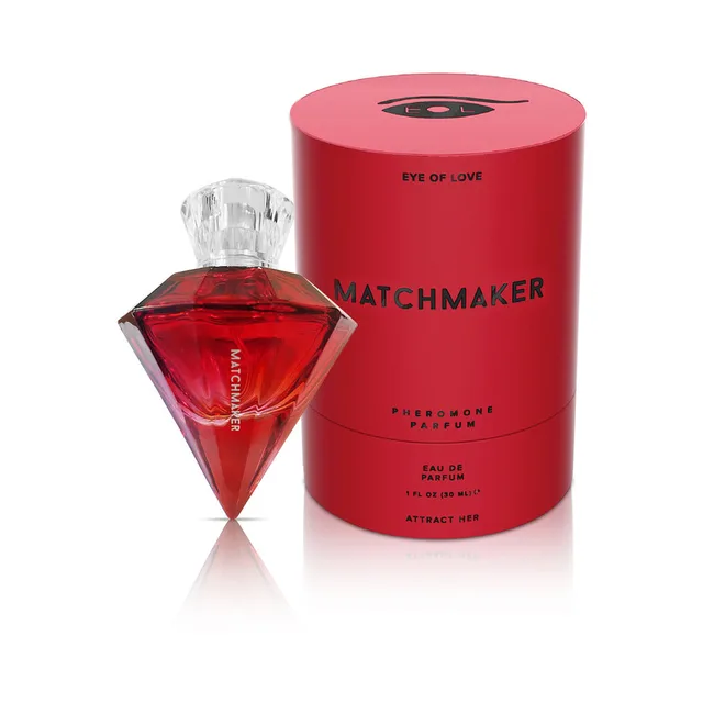 red diamond-shaped Attract Her bottle with cylindrical red box