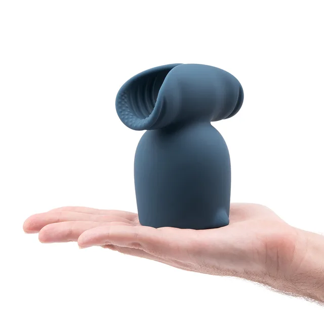Le Wand Stroke blue silicone attachment attachment balanced on one hand