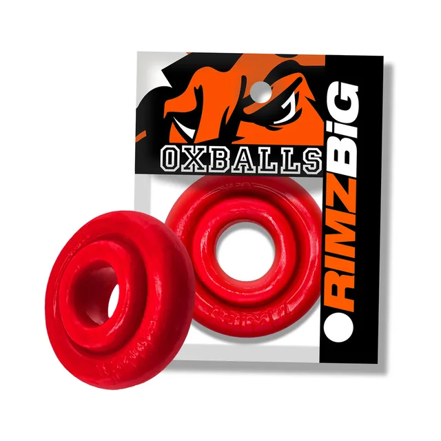 Red Oxballs Rimz Big wide-profile ring beside branded package