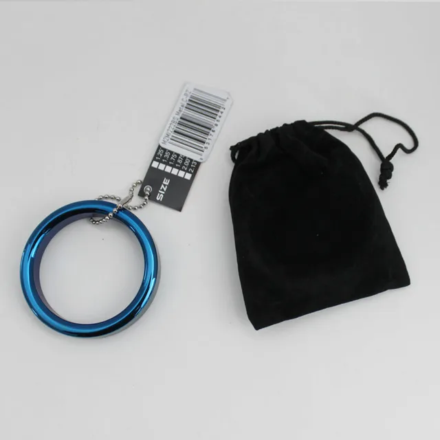 M2M Blue Steel Metal Ring 2 Inch beside black drawstring storage pouch