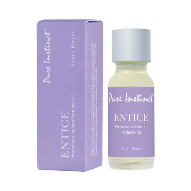 Pure Instinct Entice half-ounce perfume oil with white dropper cap beside lavender box