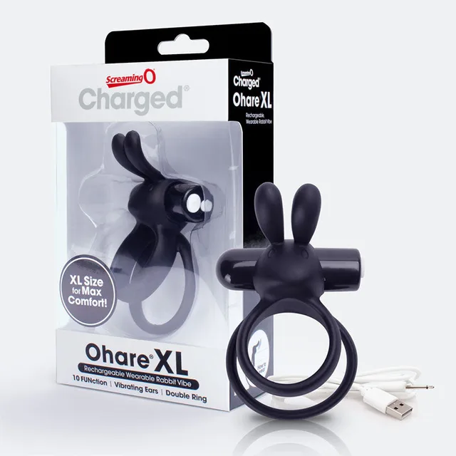 Screaming O Charged Ohare XL black ring beside clear retail package with twin ears, double loops and white USB cable