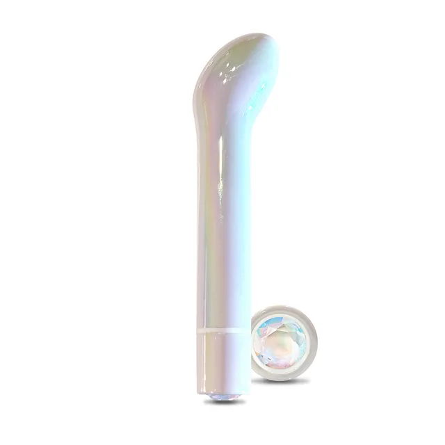 WINX Sweet Giggles slim vibrator standing beside round gemstone-style base