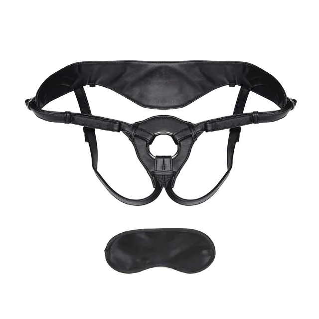 Lux Fetish Black Faux Leather Harness black harness and eye mask laid flat