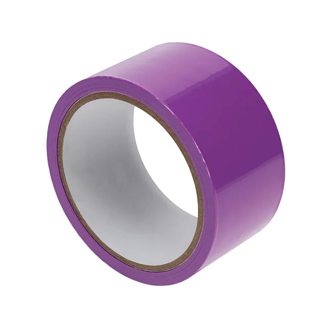 Angled view of glossy purple Ouch PVC tape roll with white core