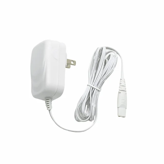 white Magic Wand Mini wall power adapter with coiled barrel-connector cord