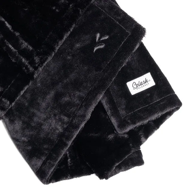 Splash Blanket Furlush large black blanket folded with logo patch