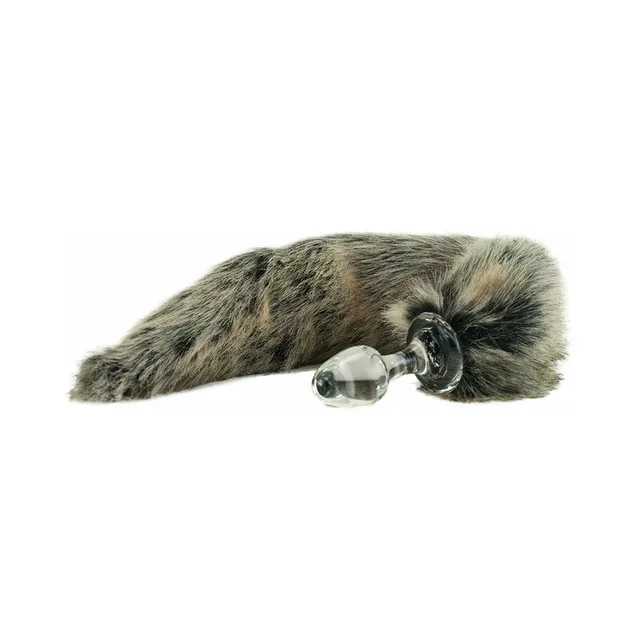 clear glass plug with long mottled grey-brown wolf-style tail