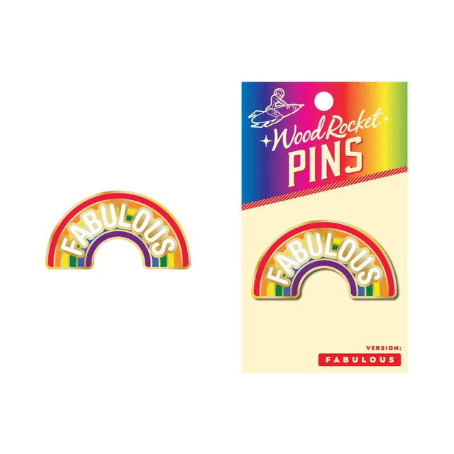 Wood Rocket Fabulous rainbow enamel pin with arched lettering beside its card